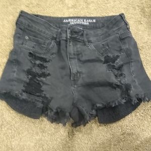 American Eagle Black ripped shorts with floral pockets